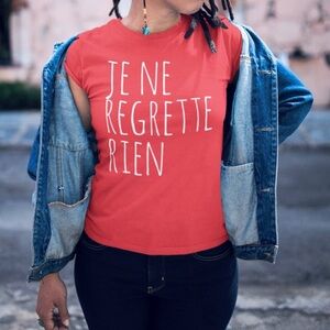 Bold Red Tee with French Phrase “I Regret Nothing”